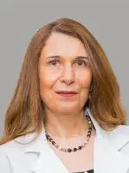 Dr. Corina Serer