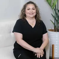 Corletta Aririguzo, NP